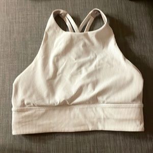 Lululemon high neck long line sports bra with a cross back. Never worn.
